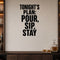 Tonight's Plan: Pour, Sip, Stay removable vinyl wall decal shown in a styled room.