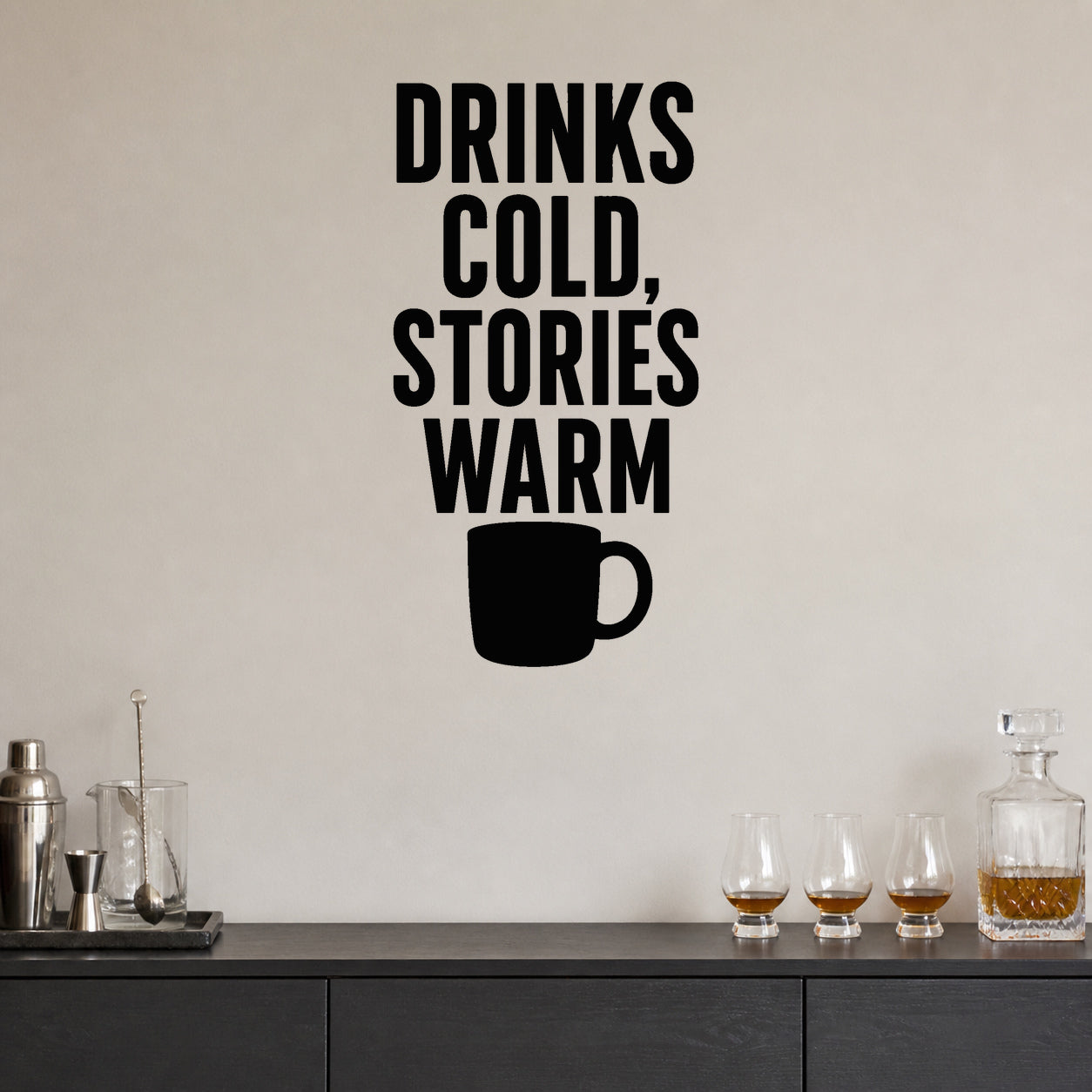 Drinks Cold, Stories Warm removable vinyl wall decal shown in a styled room.