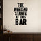 The Weekend Starts at This Bar removable vinyl wall decal shown in a styled room.