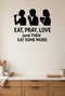 Eat, Pray, Love (and Then Eat Some More) black vinyl wall decal shown on a smooth kitchen wall