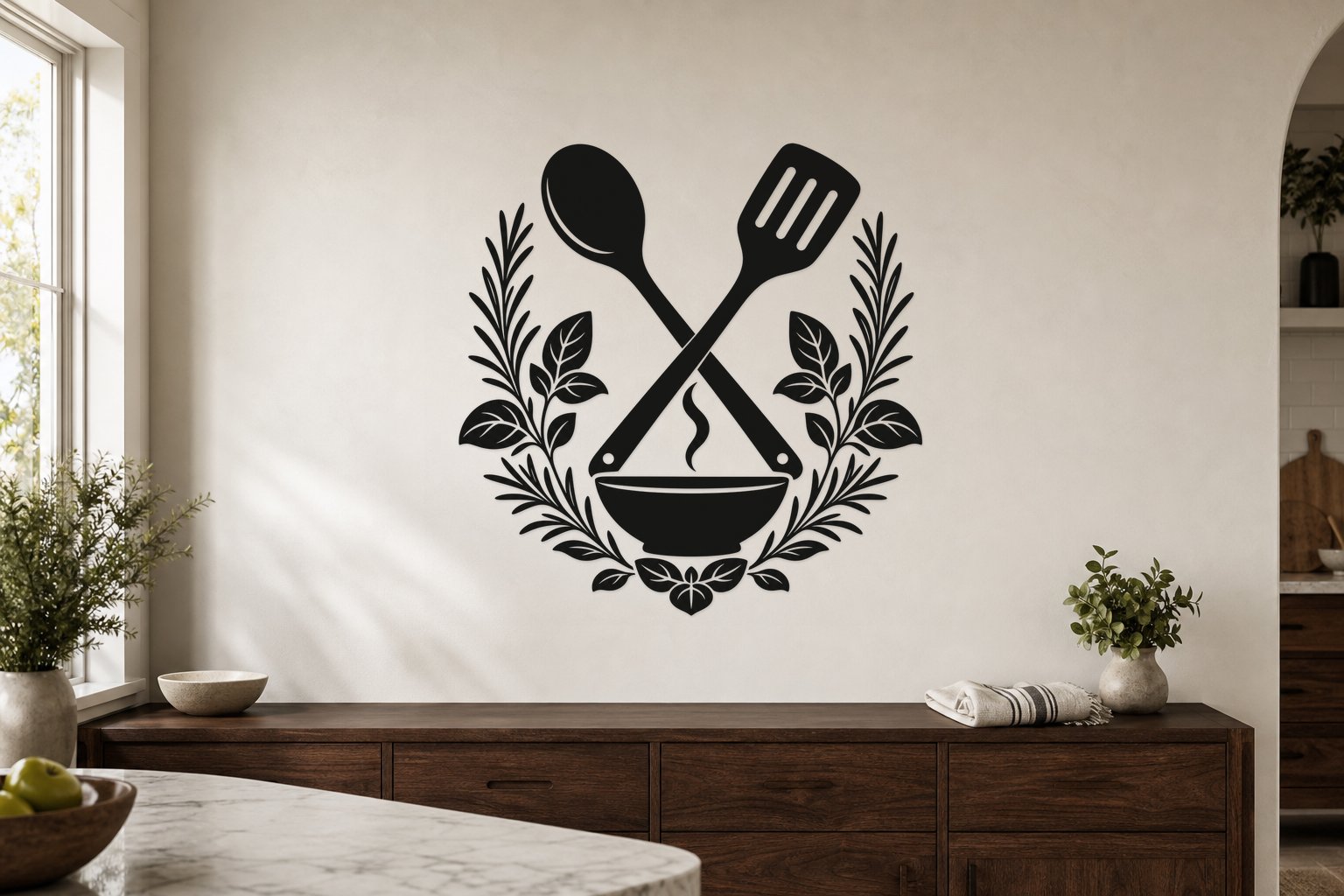 Exact black botanical kitchen utensils wall decal with crossed spoon, spatula, herb wreath, steaming bowl, and leaf ornament on a warm kitchen wall.