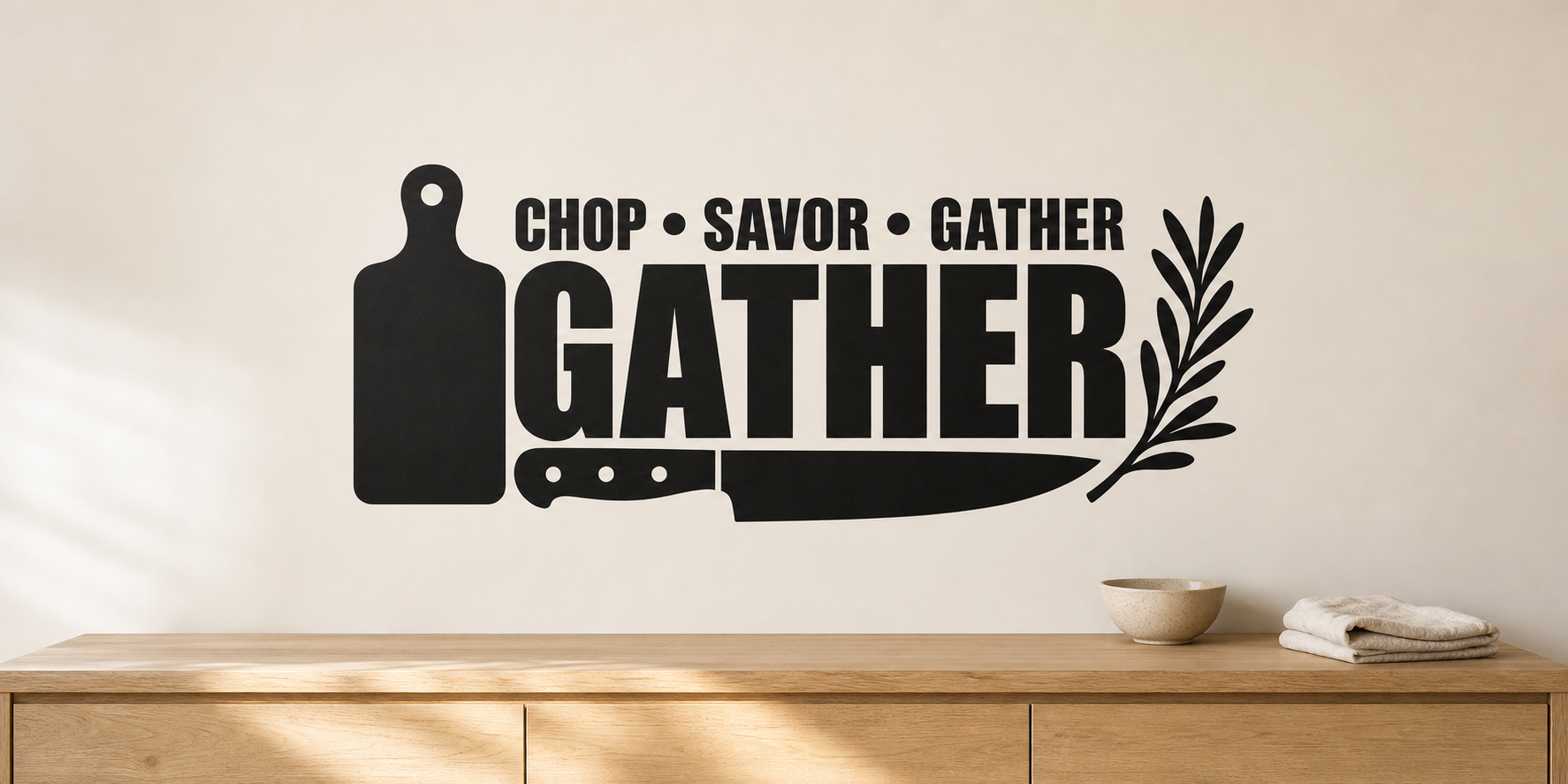 Black Chop Savor Gather kitchen wall decal with cutting board, chef knife, and herb sprig above a light oak sideboard.