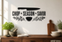 Exact CHOP SEASON SAVOR matte black vinyl kitchen decal above a walnut home chef prep station.