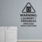 Warning: Laundry In Progress, Proceed With Caution - Funny Laundry Room Wall Decal Vinyl Sticker Removable shown as a removable vinyl wall decal in a category-appropriate room