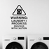 Warning: Laundry In Progress, Proceed With Caution - Funny Laundry Room Wall Decal Vinyl Sticker Removable shown as a removable vinyl wall decal in a second room setting
