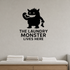 The Laundry Monster Lives Here - Funny Laundry Room removable vinyl wall decal shown in an alternate room setting