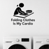 Folding Clothes Is My Cardio - Funny Laundry Room Wall Decal Vinyl Sticker Removable shown as a removable vinyl wall decal in a category-appropriate room