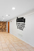 FD-MANCAVE-003 wall decal shown applied with correct perspective on a man cave wall