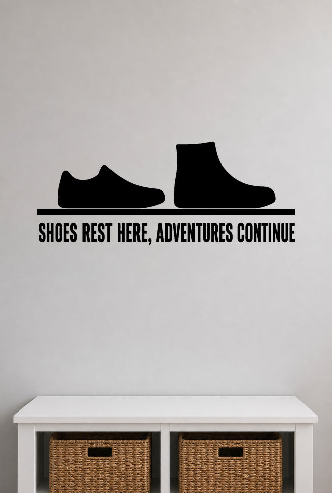 Shoes Rest Here, Adventures Continue removable vinyl wall decal shown in a mudroom / entryway setting.