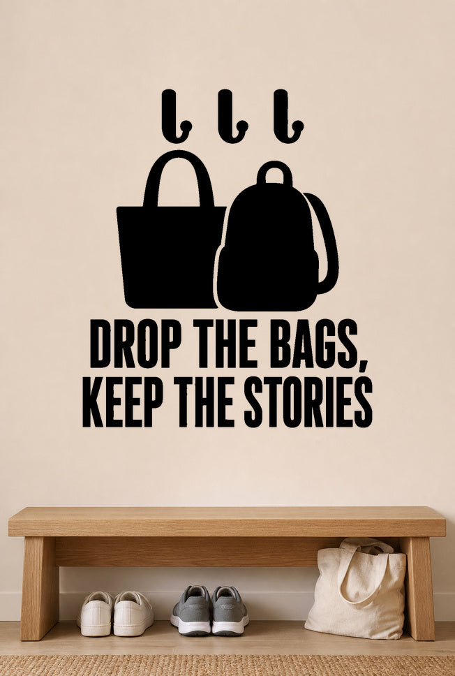 Drop The Bags, Keep The Stories removable vinyl wall decal shown in a mudroom / entryway setting.