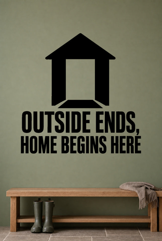 Outside Ends, Home Begins Here removable vinyl wall decal shown in a mudroom / entryway setting.