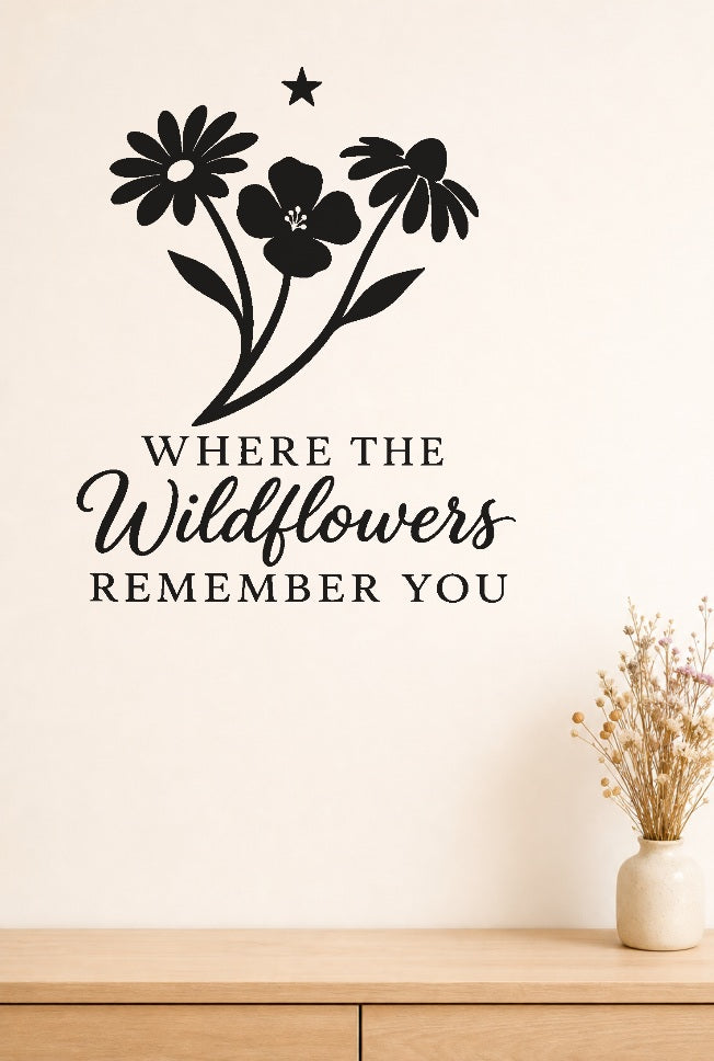 Where the Wildflowers Remember You black vinyl wall decal shown applied to a smooth interior wall