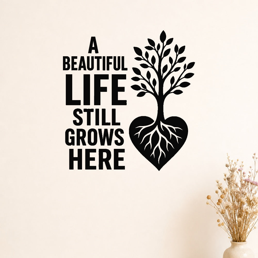 A Beautiful Life Still Grows Here removable vinyl wall decal shown on a smooth interior wall