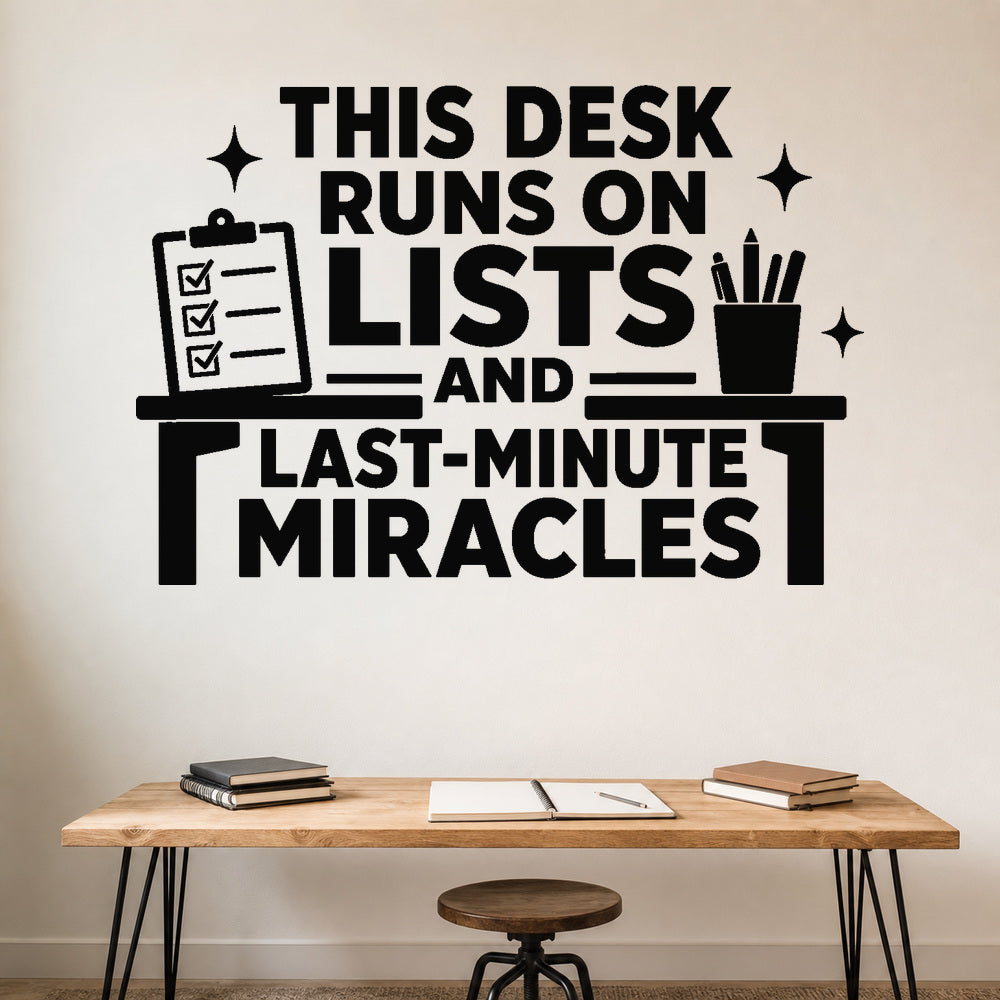 This Desk Runs On Lists And Last-Minute Miracles removable vinyl wall decal shown on a smooth home office wall