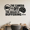 The Camera Is Off The Brain Is Buffering removable vinyl wall decal shown on a smooth home office wall