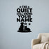 The Quiet Still Knows Your Name removable vinyl wall decal shown on a smooth interior wall
