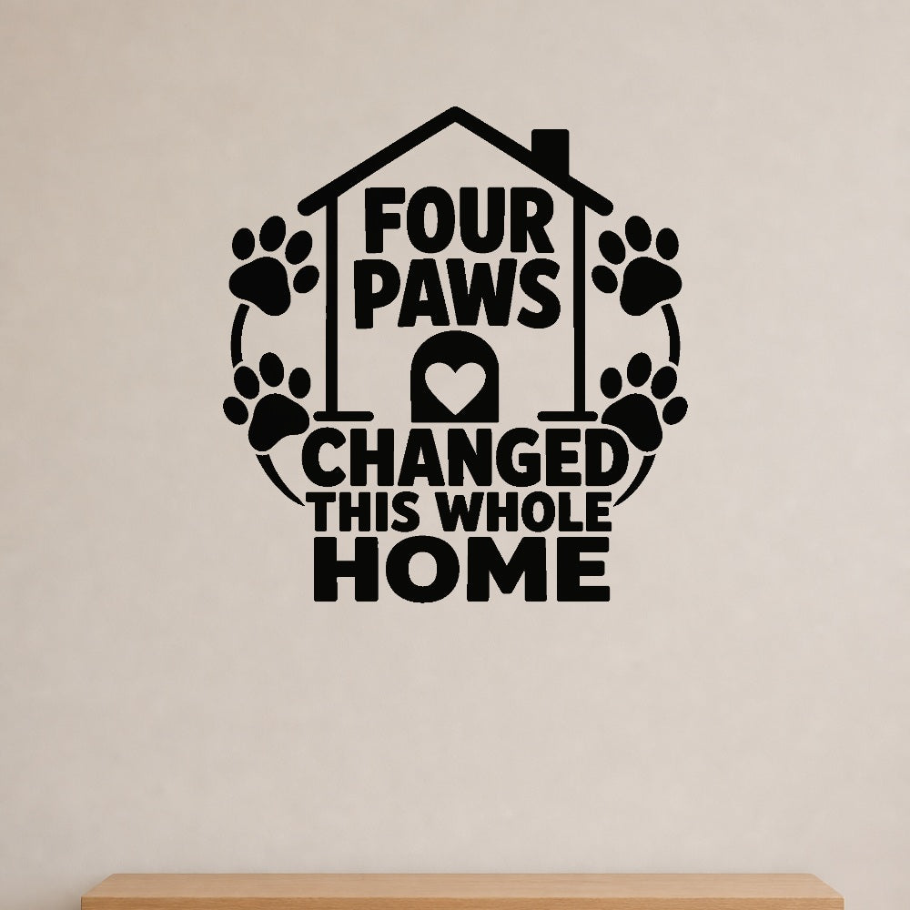 Four Paws Changed This Whole Home removable vinyl wall decal shown on a smooth interior wall