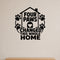 Four Paws Changed This Whole Home removable vinyl wall decal shown on a smooth interior wall