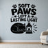 Soft Paws Left a Lasting Light large-format removable vinyl wall decal shown on a smooth interior wall