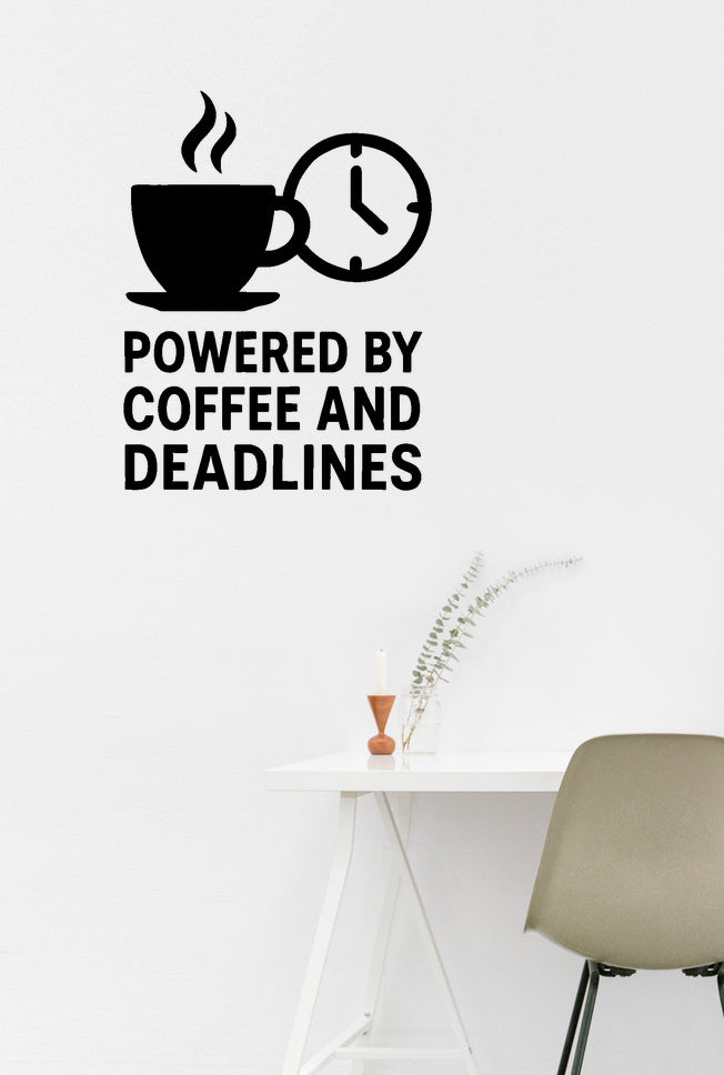 Powered by Coffee and Deadlines - Funny Home Office Wall Decal Vinyl Sticker Removable shown on a home office wall