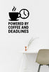 Powered by Coffee and Deadlines - Funny Home Office Wall Decal Vinyl Sticker Removable shown on a home office wall