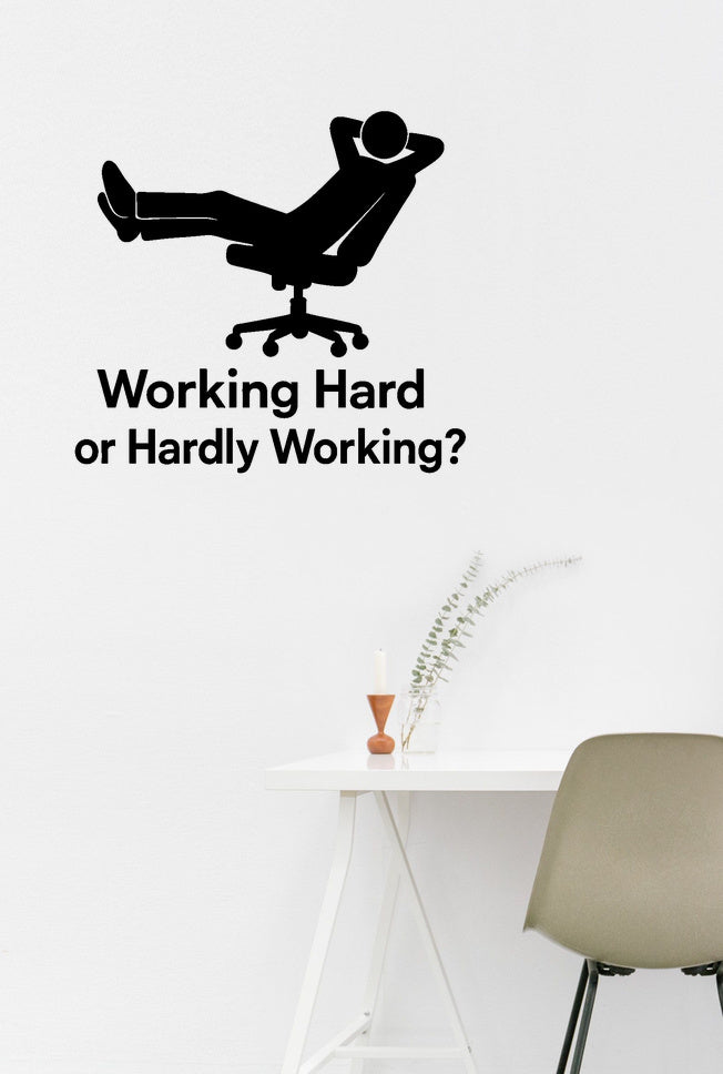 Working Hard or Hardly Working? - Funny Home Office Wall Decal Vinyl Sticker Removable shown on a home office wall