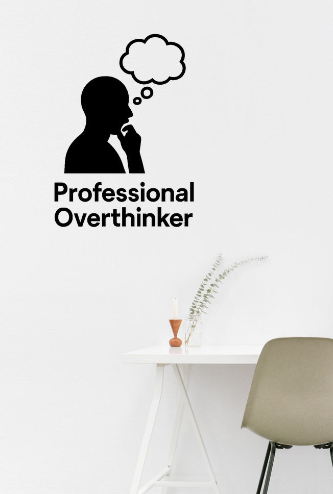 Professional Overthinker - Funny Home Office Wall Decal Vinyl Sticker Removable shown on a home office wall