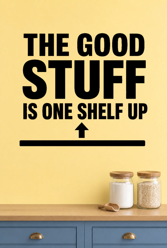 The Good Stuff Is One Shelf Up - Pantry Wall Decal removable vinyl wall decal shown on a smooth interior wall