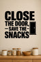 Close The Door, Save The Snacks removable vinyl wall decal shown in a pantry setting.