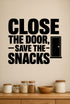Close The Door, Save The Snacks removable vinyl wall decal shown in a pantry setting.