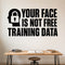 Your Face Is Not Free Training Data removable vinyl wall decal shown in a styled room.