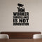 Worker Surveillance Is Not Innovation removable vinyl wall decal shown in a styled room.