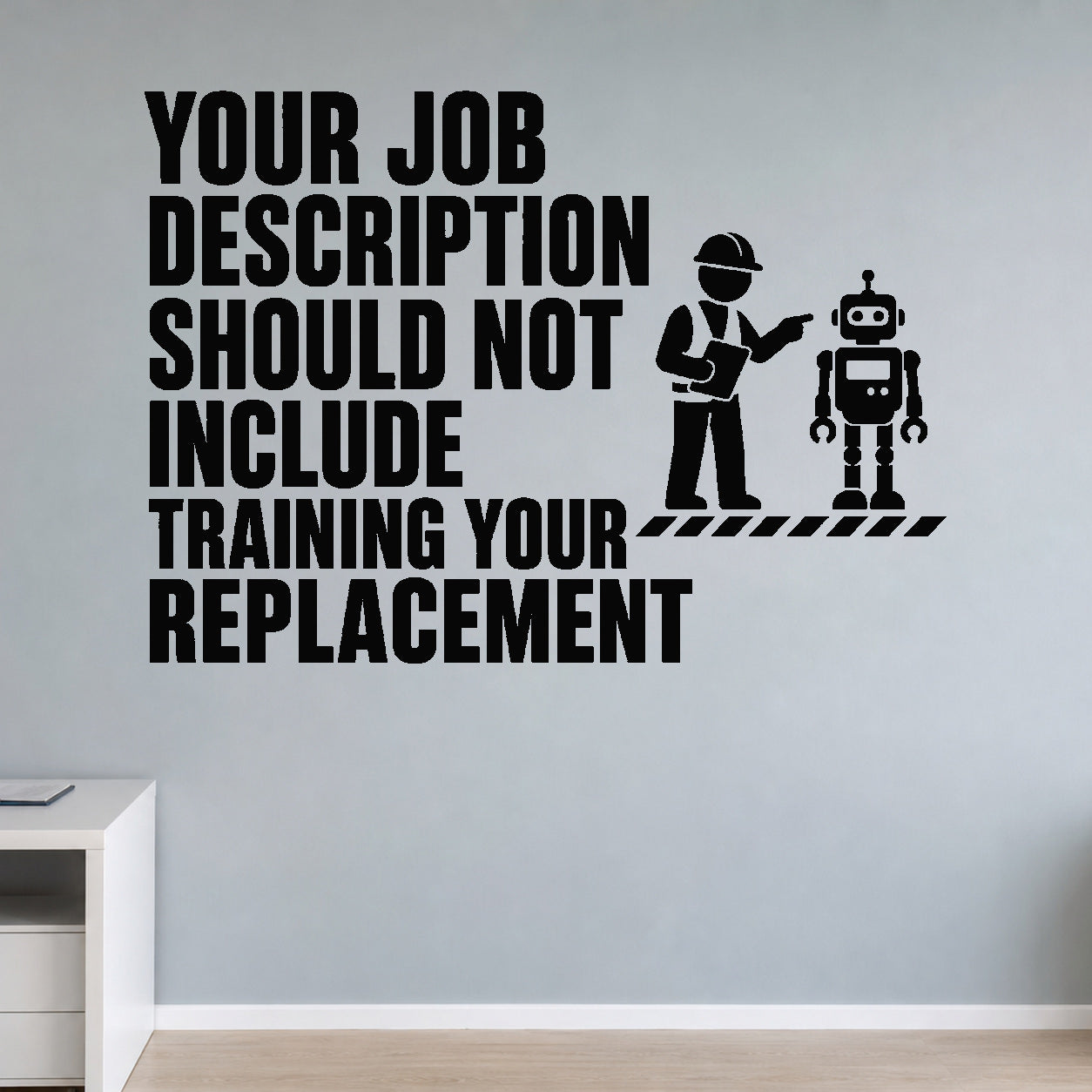 Your Job Description Should Not Include Training Your Replacement removable vinyl wall decal shown in a styled room.