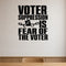 Voter Suppression Is Fear of the Voter removable vinyl wall decal shown in a styled room.