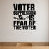 Voter Suppression Is Fear of the Voter removable vinyl wall decal shown in a styled room.