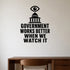 Government Works Better When We Watch It removable vinyl wall decal shown in a styled room.
