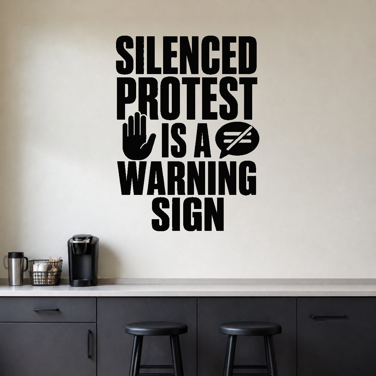 Silenced Protest Is a Warning Sign removable vinyl wall decal shown in a styled room.