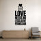 Love Needs No Legislative Permission removable vinyl wall decal shown in a styled room.