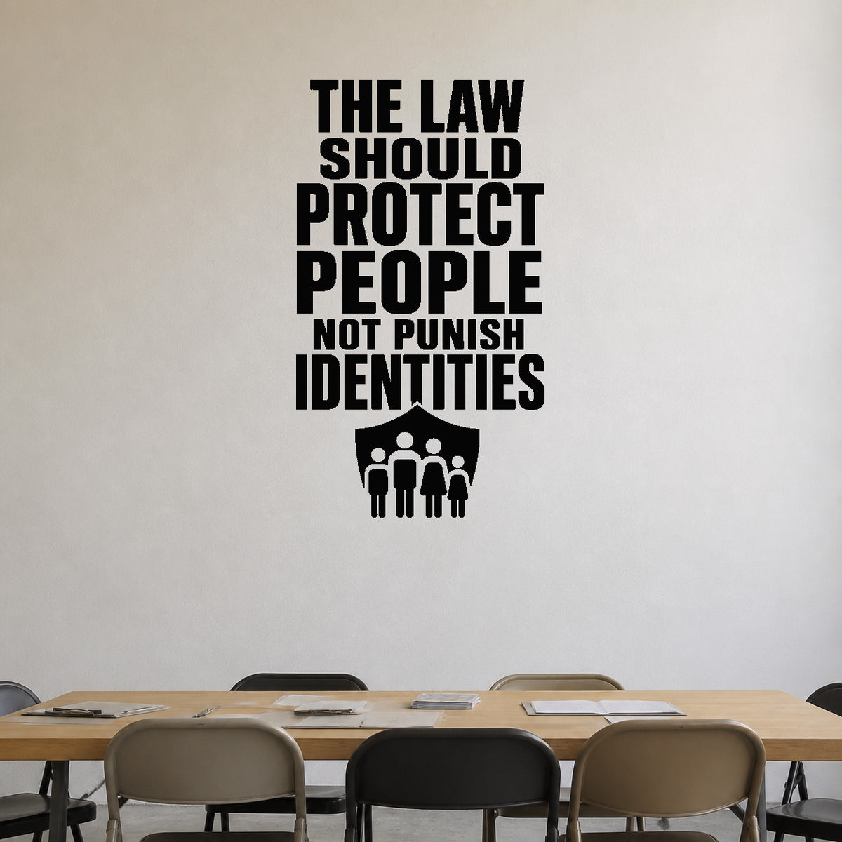 The Law Should Protect People Not Punish Identities - Democracy Rights Wall Decal removable vinyl wall decal shown on a smooth interior wall