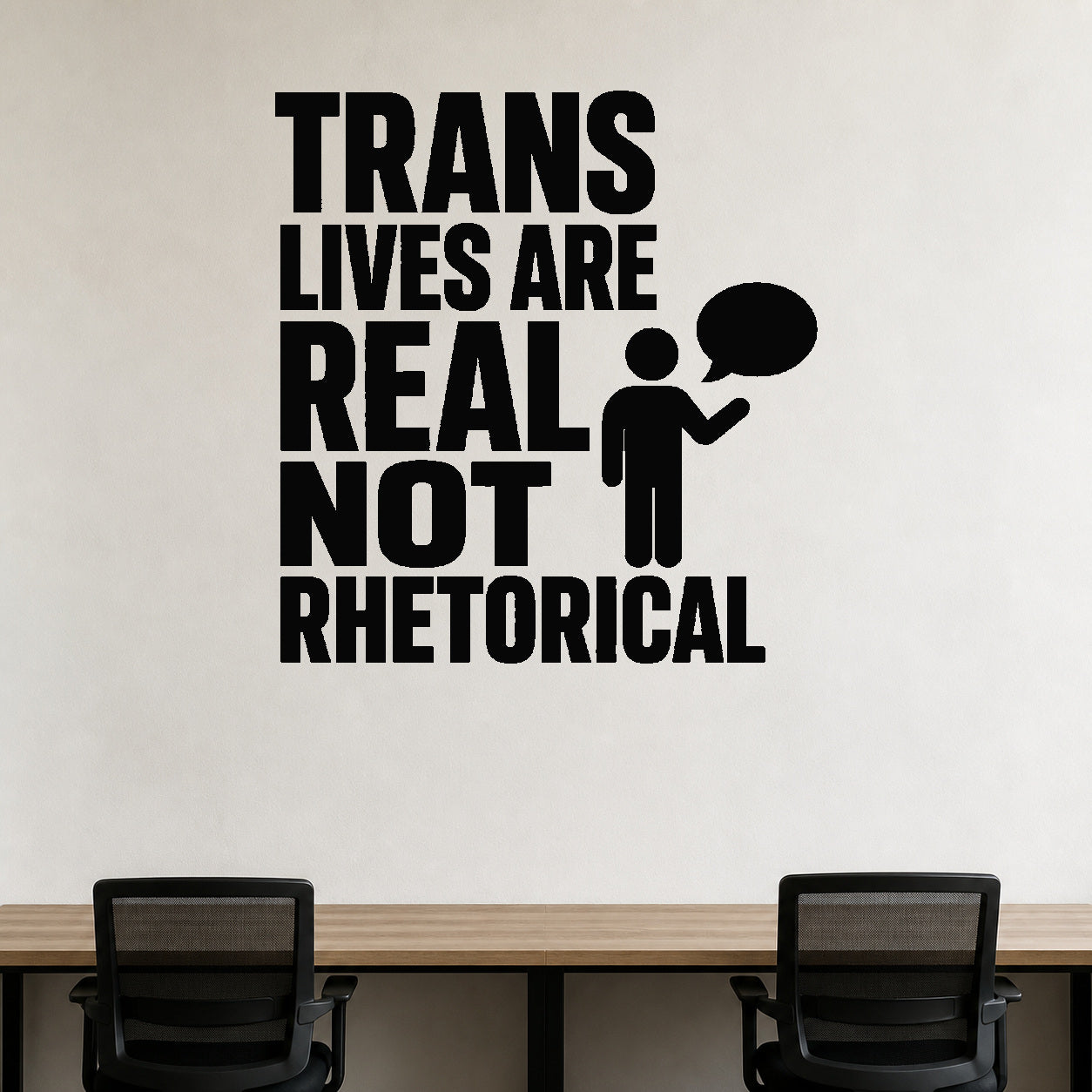Trans Lives Are Real Not Rhetorical removable vinyl wall decal shown in a styled room.