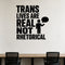 Trans Lives Are Real Not Rhetorical removable vinyl wall decal shown in a styled room.