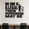 No One Is Illegal Their Paperwork May Be removable vinyl wall decal shown in a styled room.