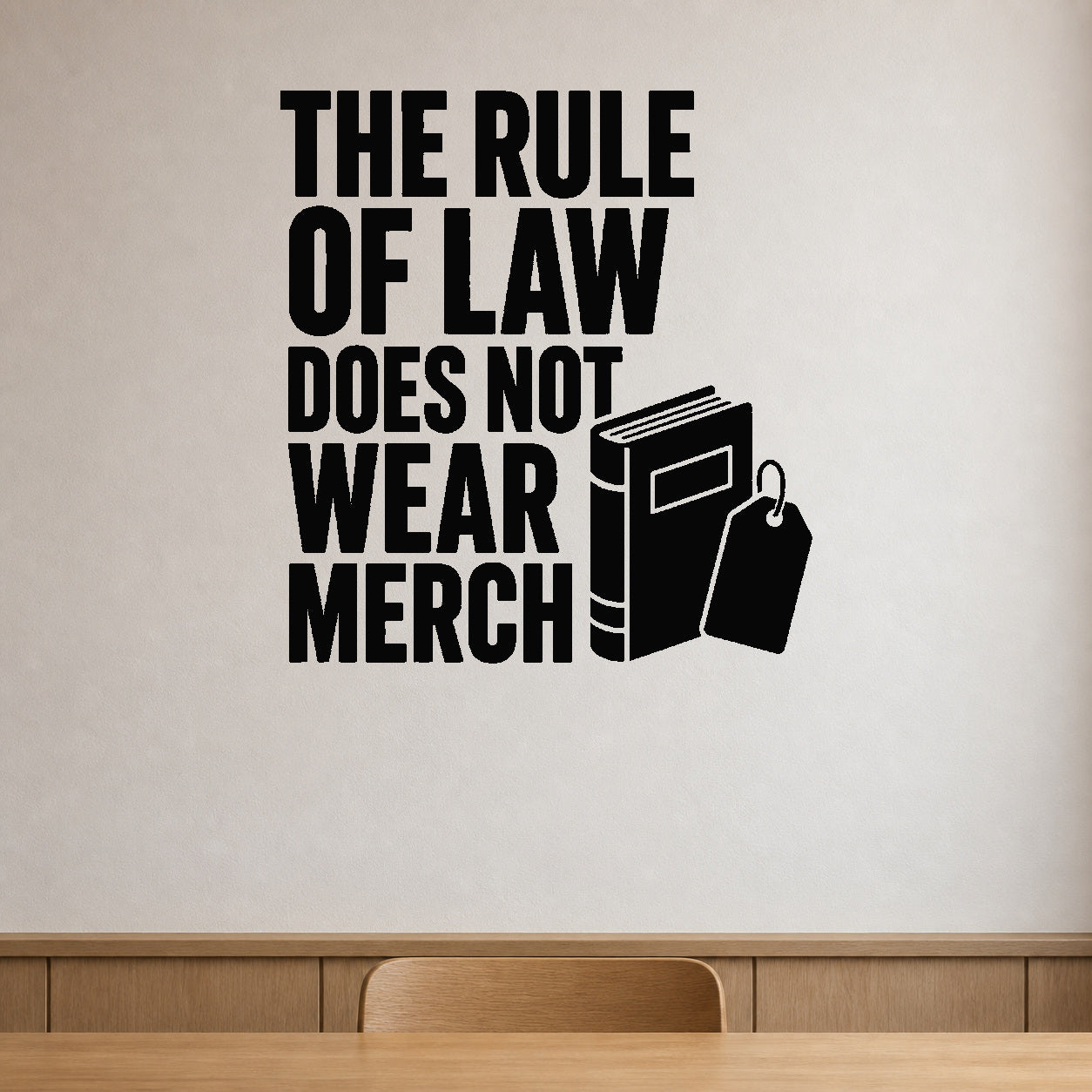 The Rule Of Law Does Not Wear Merch - Political Satire Wall Decal removable vinyl wall decal shown on a smooth interior wall