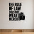 The Rule Of Law Does Not Wear Merch - Political Satire Wall Decal removable vinyl wall decal shown on a smooth interior wall