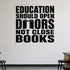 Alternate room view of the Education Should Open Doors Not Close Books removable vinyl wall decal.
