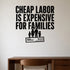 Cheap Labor Is Expensive for Families removable vinyl wall decal shown in a styled room.