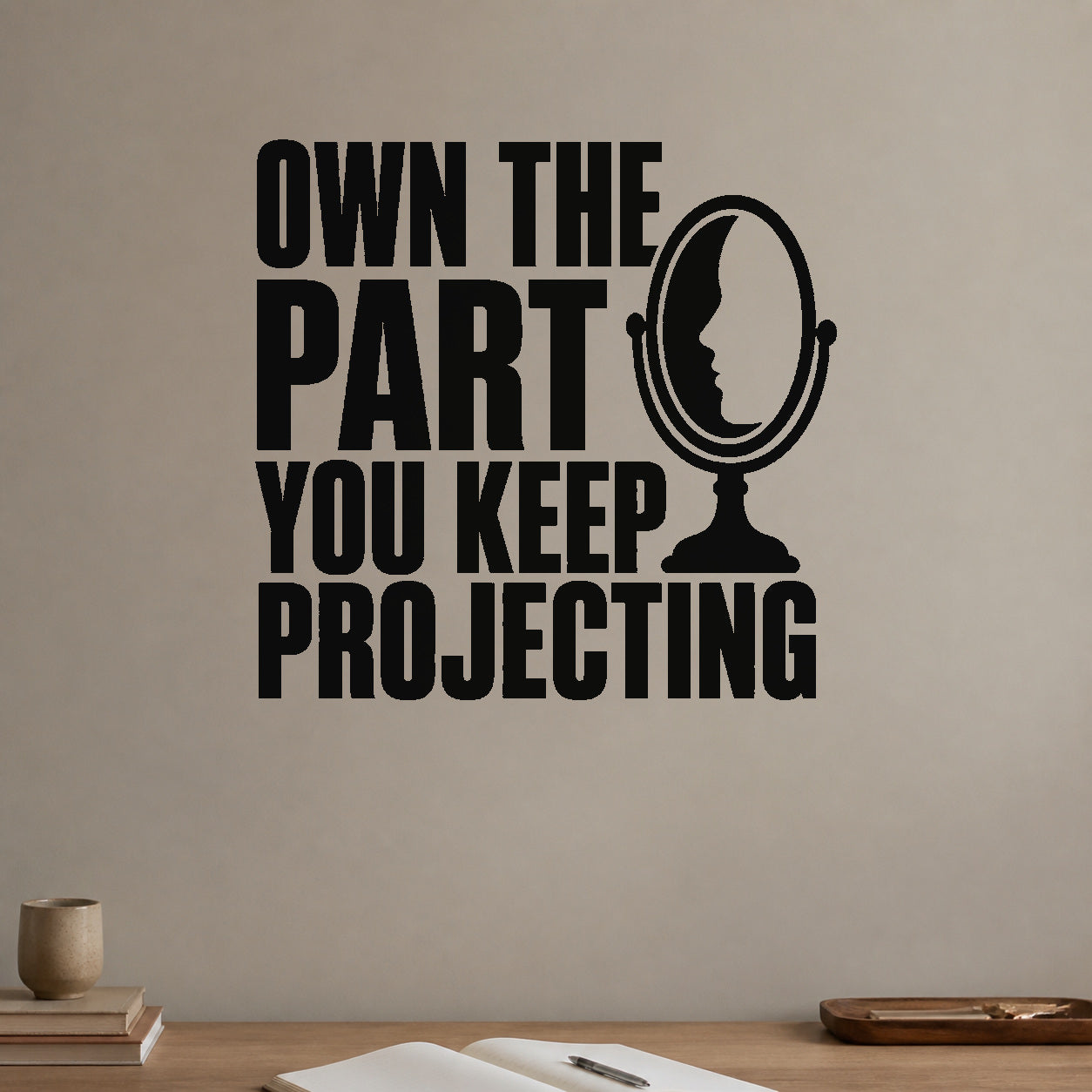 Own the Part You Keep Projecting removable vinyl wall decal shown in a styled room.