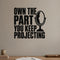 Own the Part You Keep Projecting removable vinyl wall decal shown in a styled room.