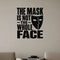 The Mask Is Not the Whole Face removable vinyl wall decal shown in a styled room.