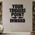 Your Triggers Point Inward removable vinyl wall decal shown in a styled room.